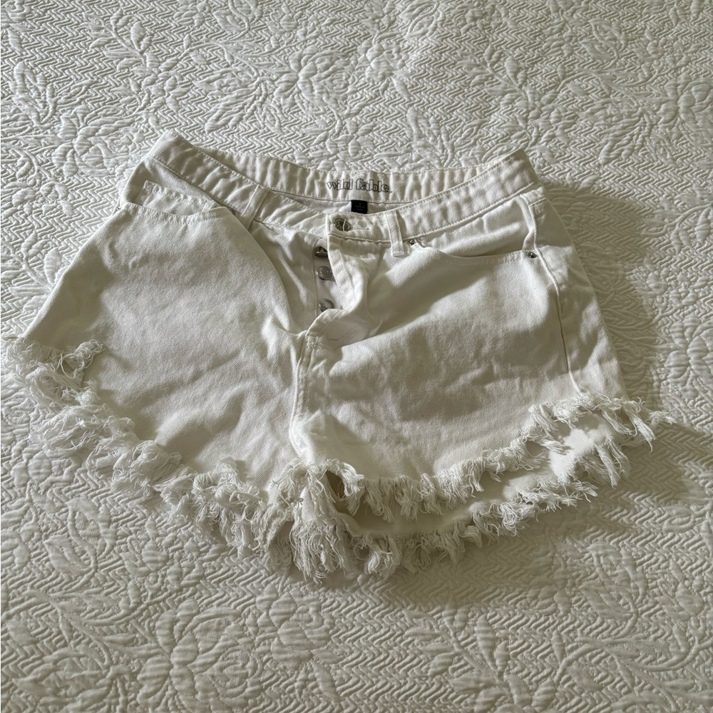 White Wild Fable shorts. In cut off fashion.